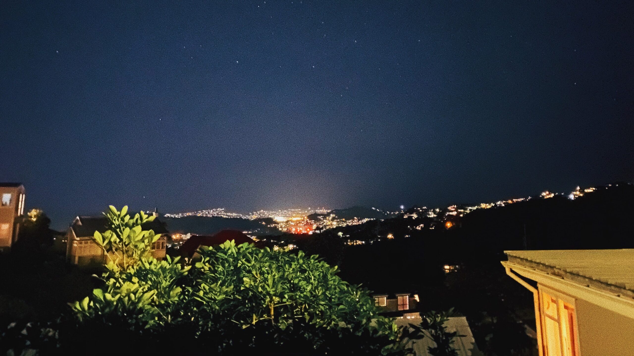 A view of Wellington hills at night with stars in the sky.