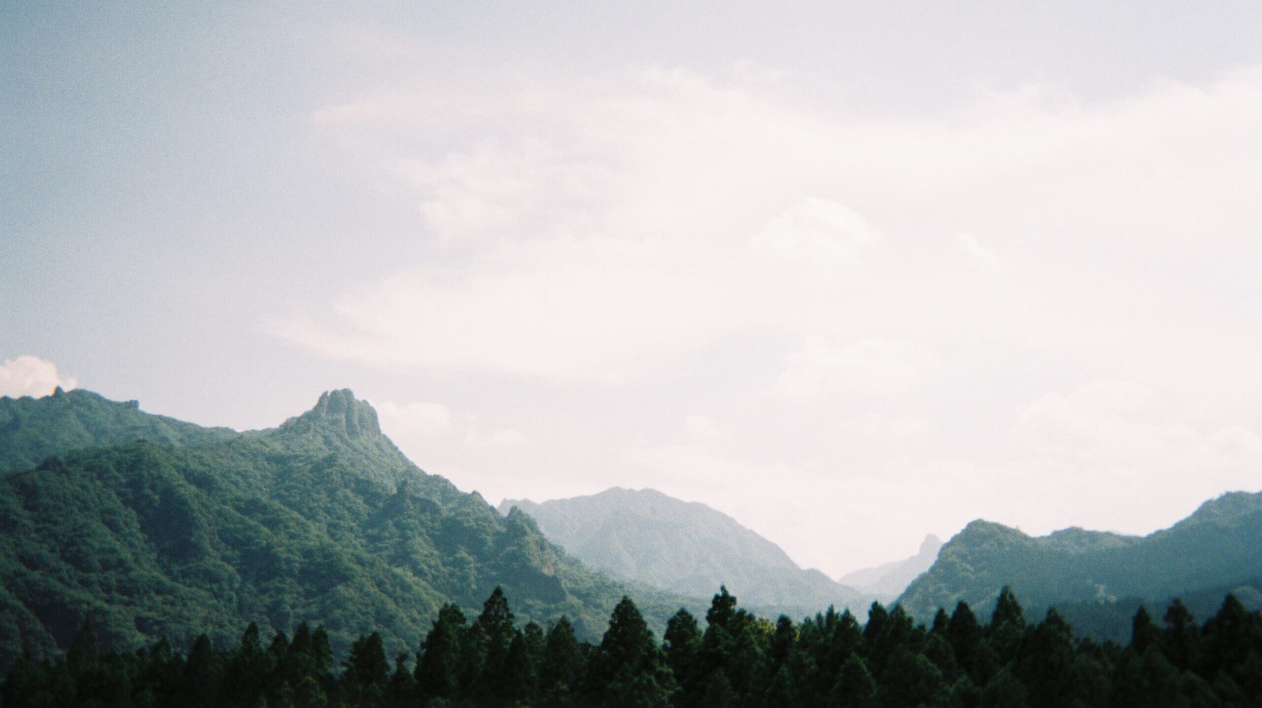 A mountain range on a humid summer's day in Nagano, Japan.