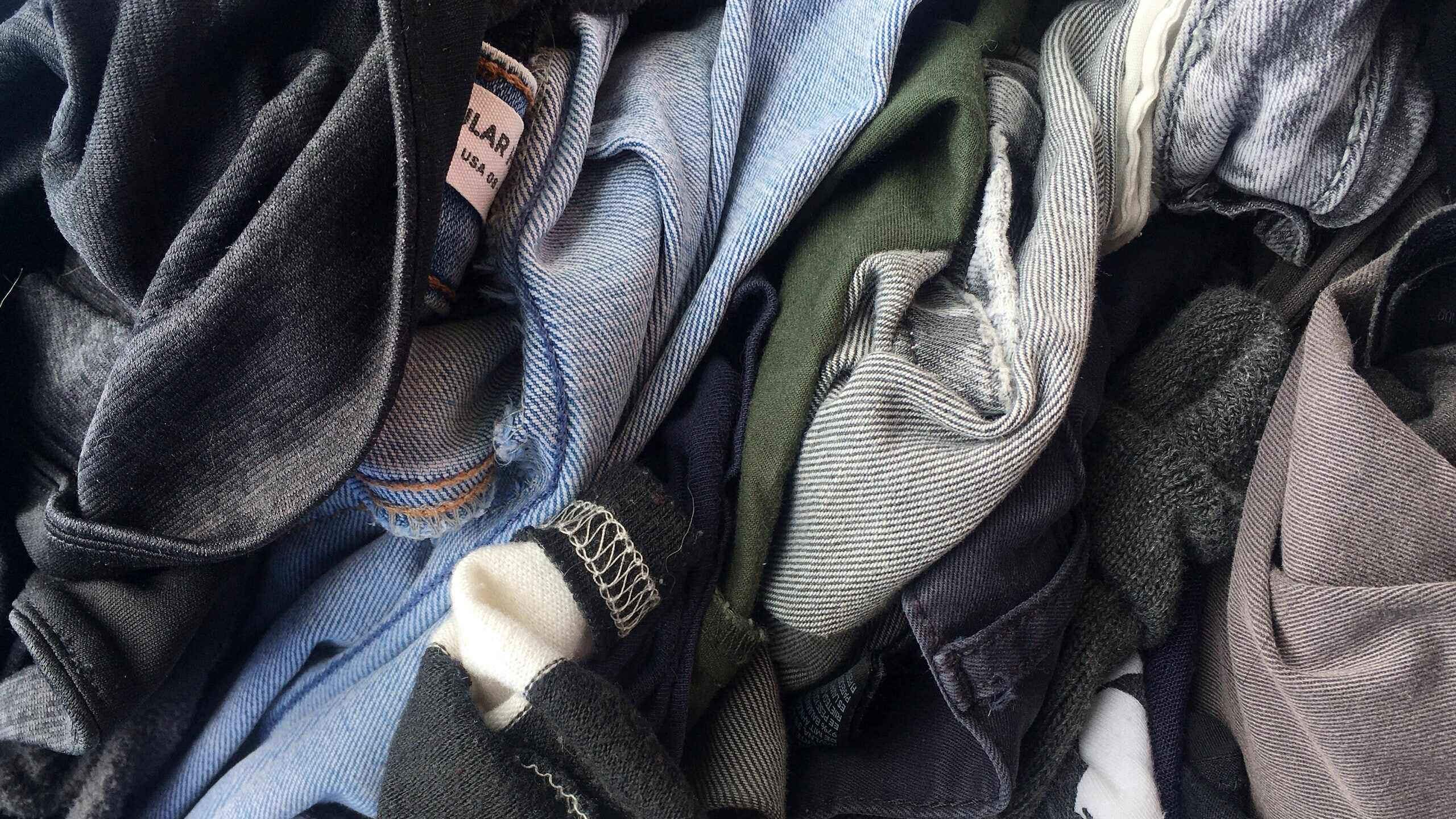 A clump of unfolded clothing.